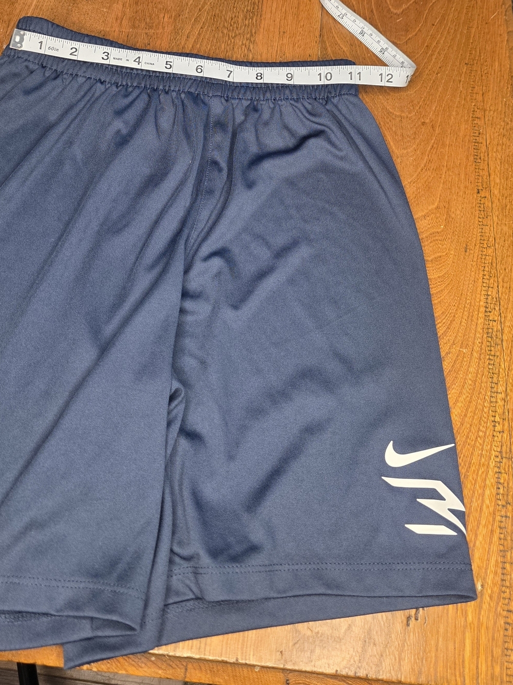 Nike Navy Blue Kids Athletic Shorts with White Swoosh